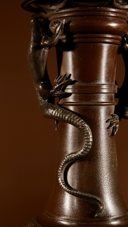  An original French table lamp in white metal with a Chinese patina.