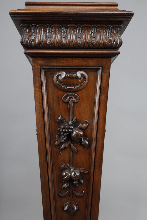 PAIR OF CARVED MOLDED WALNUT SELLETTES WITH FRUIT AND PLANT DECORATIONS