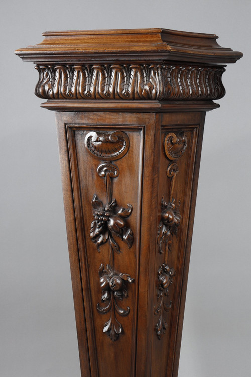 PAIR OF CARVED MOLDED WALNUT SELLETTES WITH FRUIT AND PLANT DECORATIONS