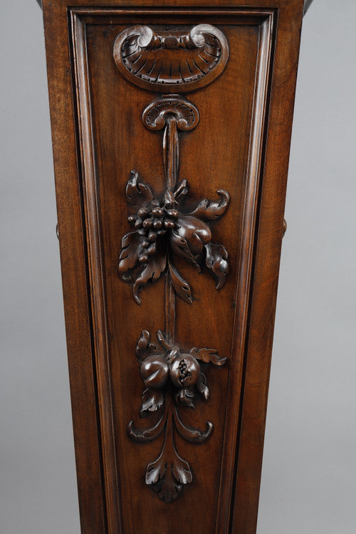 PAIR OF CARVED MOLDED WALNUT SELLETTES WITH FRUIT AND PLANT DECORATIONS