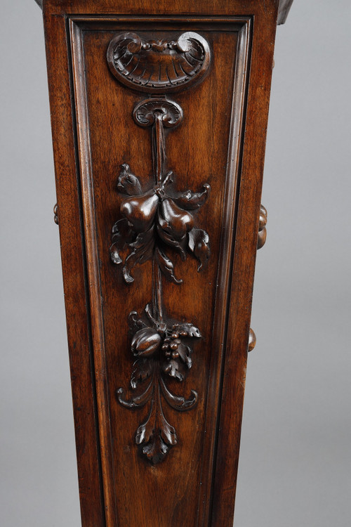 PAIR OF CARVED MOLDED WALNUT SELLETTES WITH FRUIT AND PLANT DECORATIONS