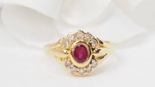 Yellow gold, ruby and diamond daisy ring