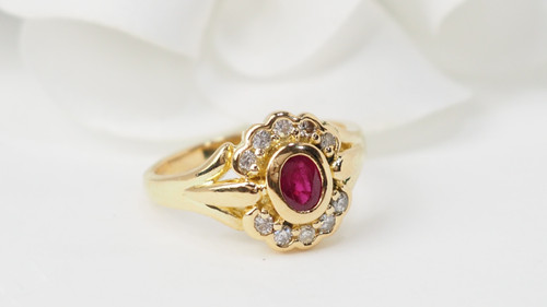 Yellow gold, ruby and diamond daisy ring