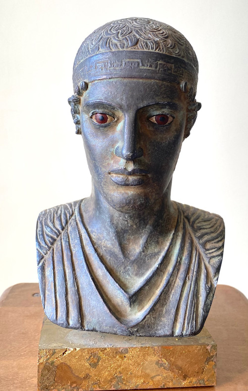 20th century patinated plaster sculpture. Head of a charioteer after the antique.