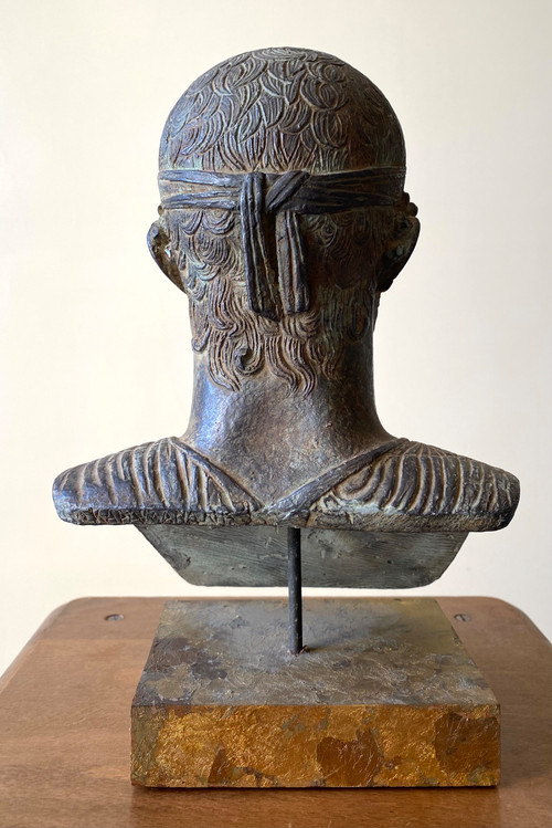 20th century patinated plaster sculpture. Head of a charioteer after the antique.