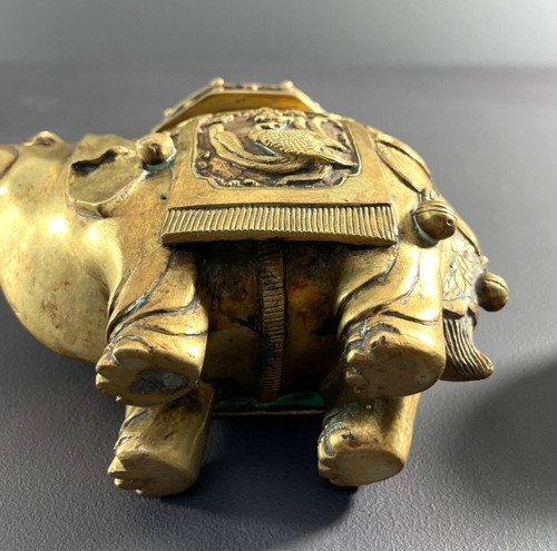 China, First Third of the 20th Century, Bronze Incense Burner with Gilded Patina Depicting an Elephant.