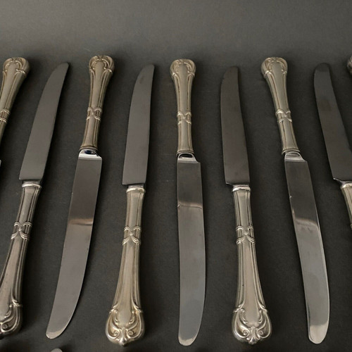 Suite of 24 Mexican silver knives, Louis XV style, early 20th century