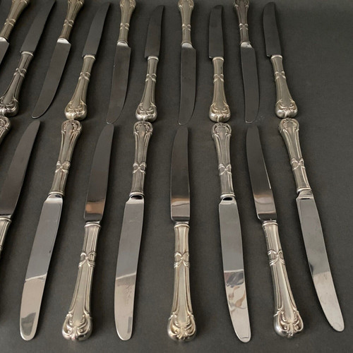 Suite of 24 Mexican silver knives, Louis XV style, early 20th century