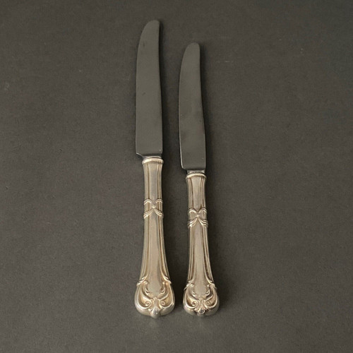 Suite of 24 Mexican silver knives, Louis XV style, early 20th century