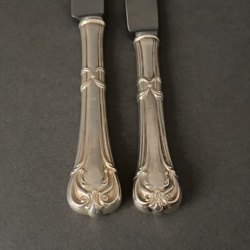 Suite of 24 Mexican silver knives, Louis XV style, early 20th century