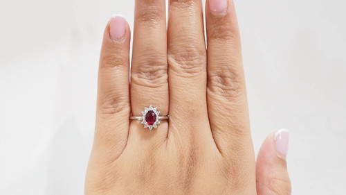 Surrounding ring in white gold, rubies and diamonds