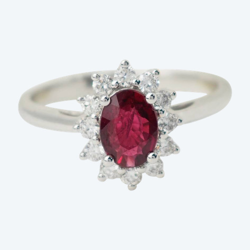 Surrounding ring in white gold, rubies and diamonds