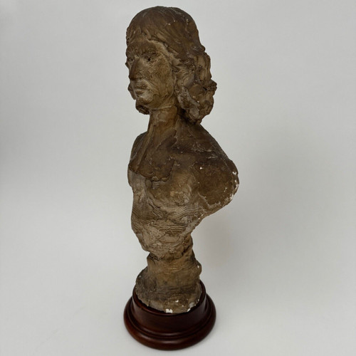 Bust in patinated plaster from the Charles Filleul workshop, 20th century, representing a man