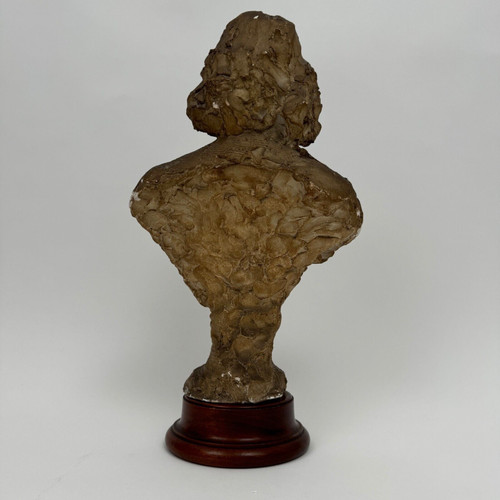 Bust in patinated plaster from the Charles Filleul workshop, 20th century, representing a man