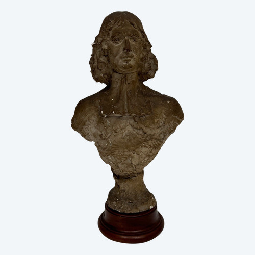 Bust in patinated plaster from the Charles Filleul workshop, 20th century, representing a man