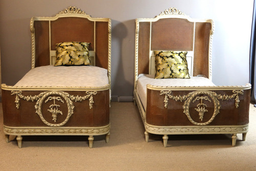 Pair of Louis XVI style caned beds