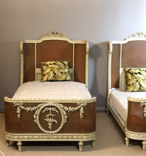 Pair of Louis XVI style caned beds