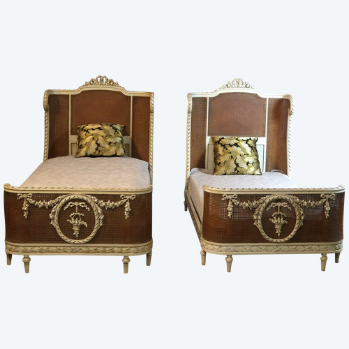 Pair of Louis XVI style caned beds