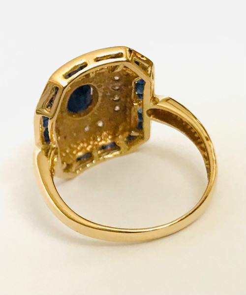 Gold cocktail ring with sapphires and diamonds