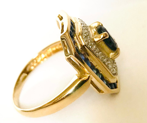 Gold cocktail ring with sapphires and diamonds