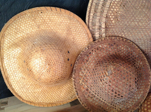 Lot of eight antique Asian hats.