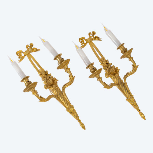 A pair of Louis XVI style ormolu sconces with quivers circa 1880