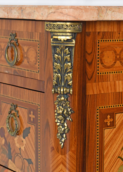 Transition style chest of drawers in marquetry with trophy decoration of musical instruments