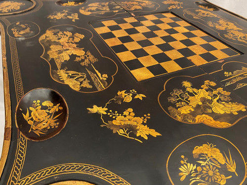 Astonishing system game table, black and gold Chinese lacquer, late 19th century