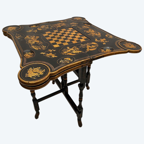 Astonishing system game table, black and gold Chinese lacquer, late 19th century