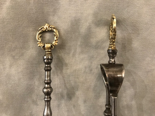 Nice fireplace set of a shovel and tongs from the 19th century.