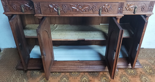 Carved oak sideboard with grapevine decoration Art Nouveau period