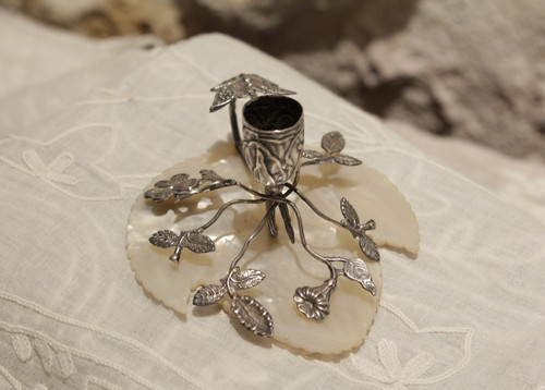 Small candlestick in sterling silver on mother-of-pearl leaf late 19th, early 20th century