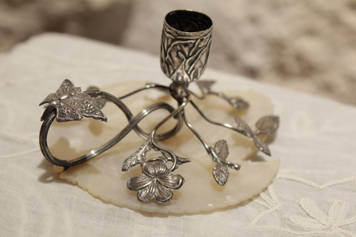 Small candlestick in sterling silver on mother-of-pearl leaf late 19th, early 20th century