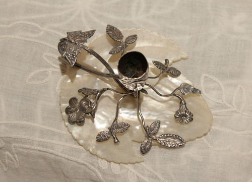 Small candlestick in sterling silver on mother-of-pearl leaf late 19th, early 20th century