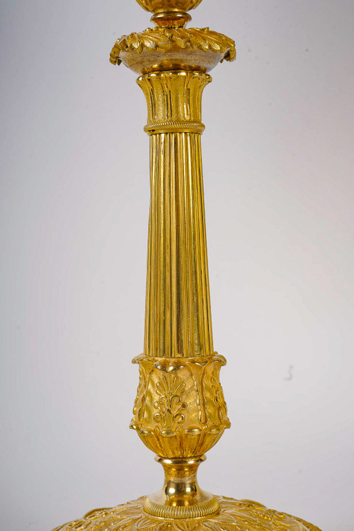 Coppia di torce in bronzo dorato e cesellato del periodo della Restaurazione montate come lampade 1820 ca.