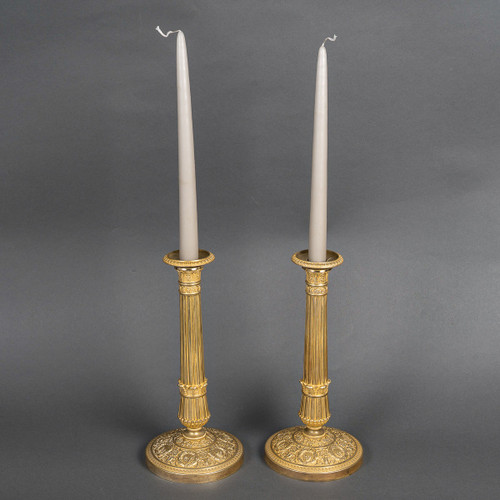 Gerard Jean Galle (1788-1846) Pair of finely chiseled and gilded bronze candlesticks circa 1820