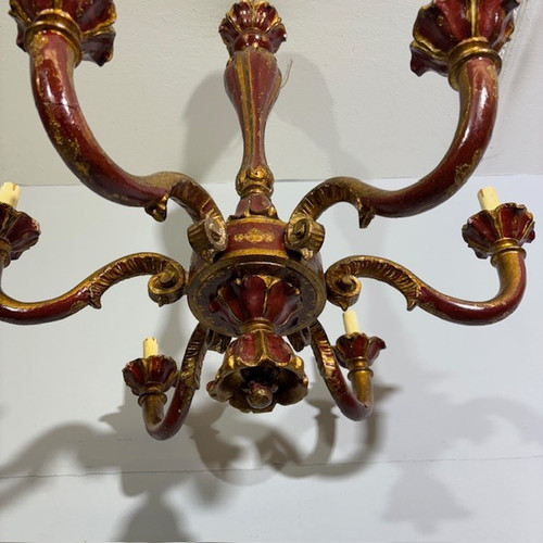 Antique Six Arm Chandelier 19th century era painted ruby and gold . All carved .