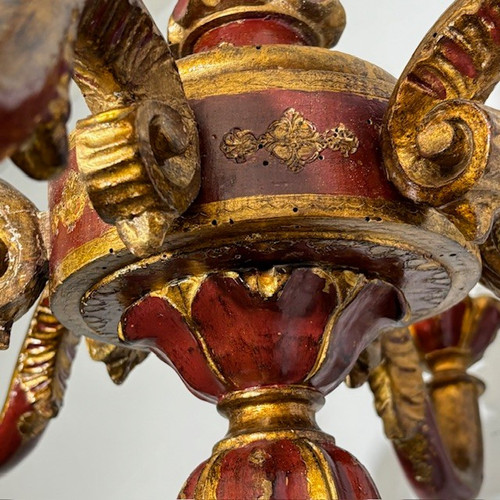 Antique Six Arm Chandelier 19th century era painted ruby and gold . All carved .