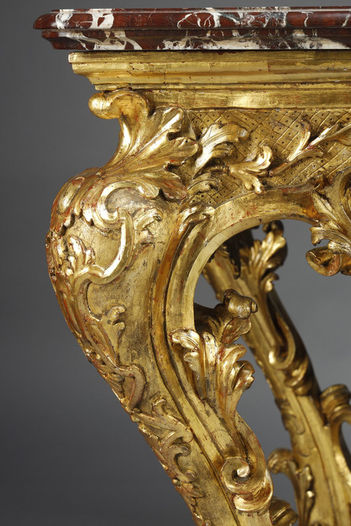 LARGE RECTANGULAR CONSOLE IN RICHLY CARVED AND GILDED WOOD