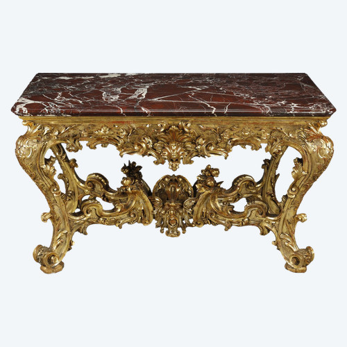 LARGE RECTANGULAR CONSOLE IN RICHLY CARVED AND GILDED WOOD