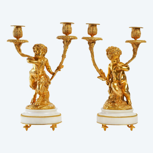 Coppia di candelabri Amour et Faune in bronzo dorato in stile Luigi XVI secondo Clodion e Delarue ver