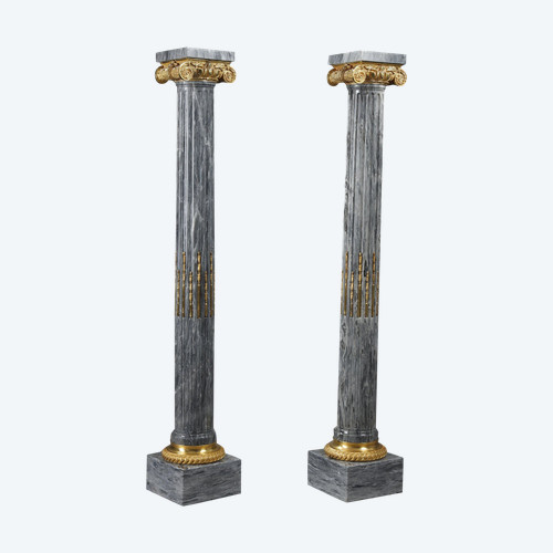 PAIR OF FLUTED MARBLE COLUMNS WITH IONIC CAPITALS