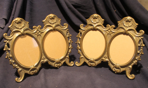 Pair of oval bronze and brass frames in the Louis XV style 20th century