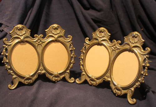 Pair of oval bronze and brass frames in the Louis XV style 20th century