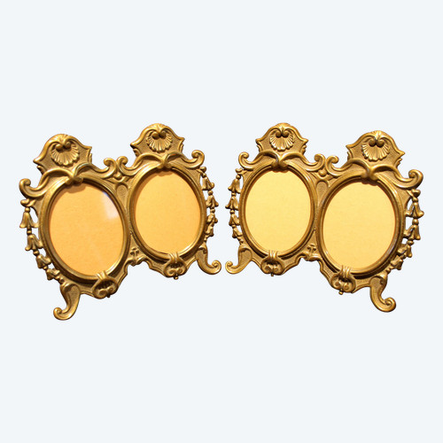 Pair of oval bronze and brass frames in the Louis XV style 20th century