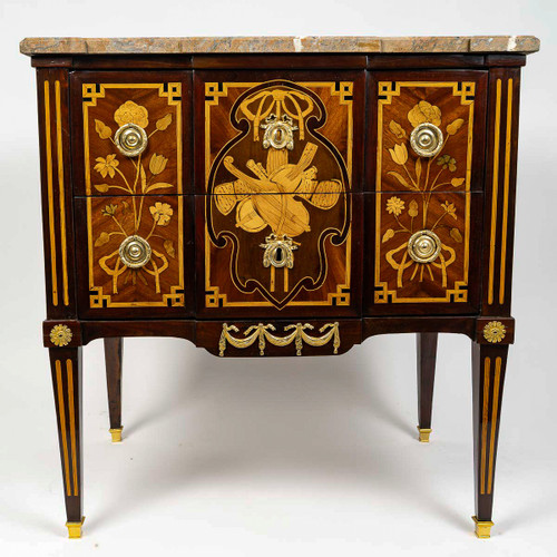 A commode Sauteuse with musical instruments marquetry, Louis XVI period circa 1780