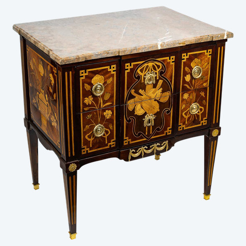 A commode Sauteuse with musical instruments marquetry, Louis XVI period circa 1780