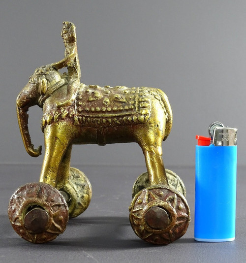 India, Early 20th Century, Bronze Cornac toy perched on an elephant.