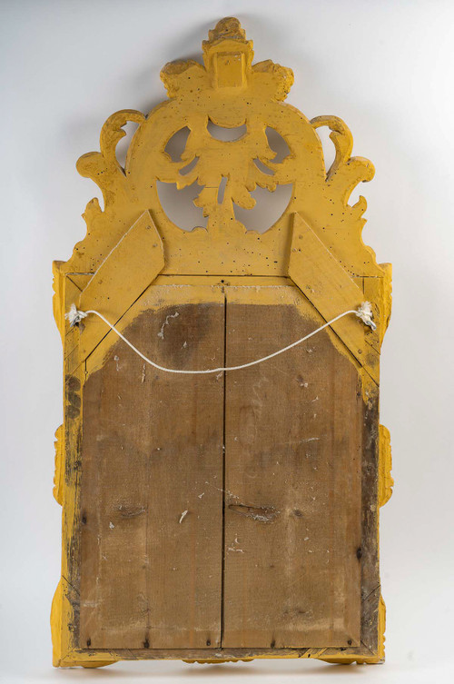 A French Regence period giltwood openwork pediment mirror circa 1720