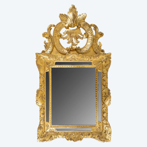 A French Regence period giltwood openwork pediment mirror circa 1720